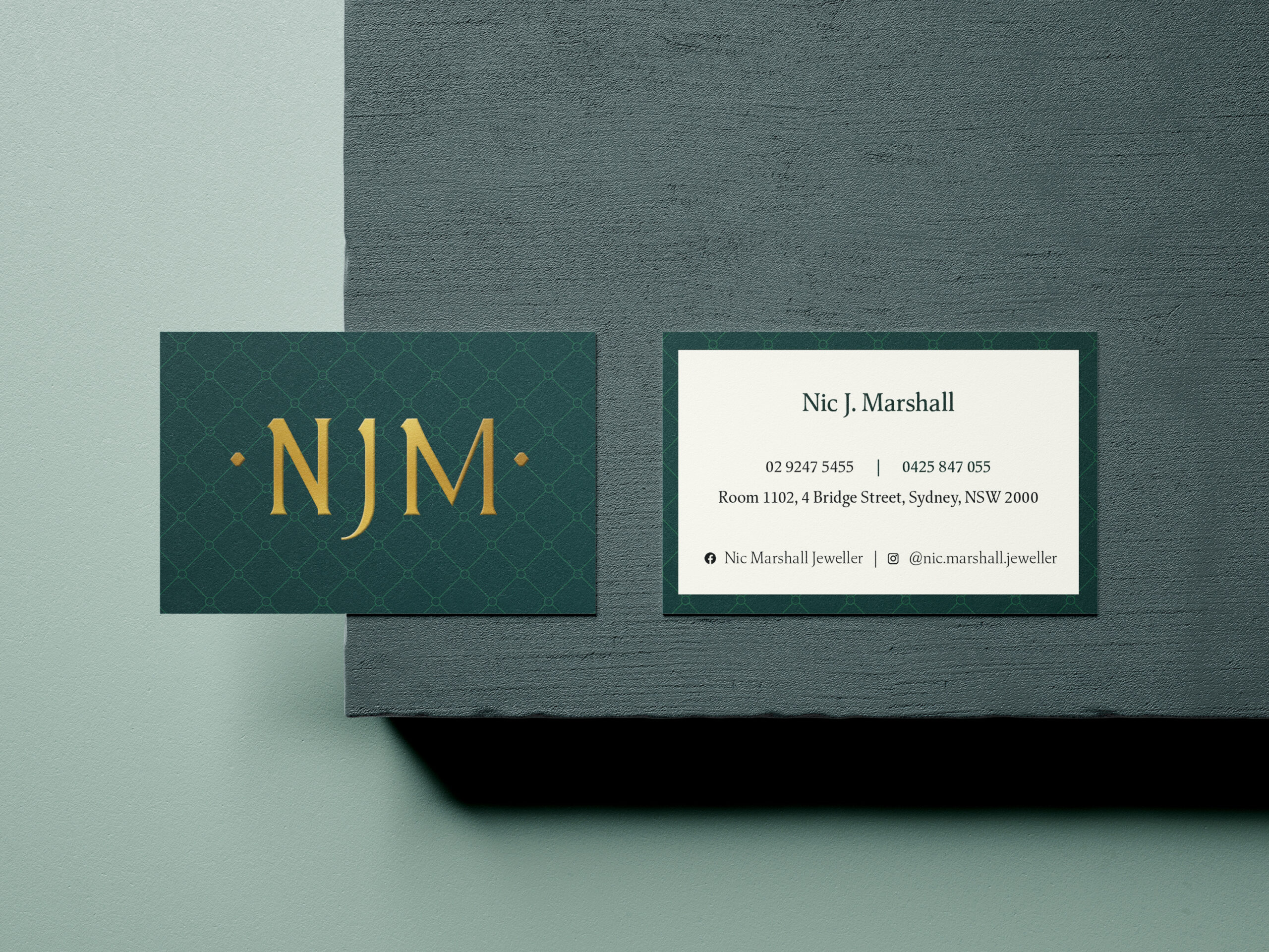 NJM business cards front and back, side by side
